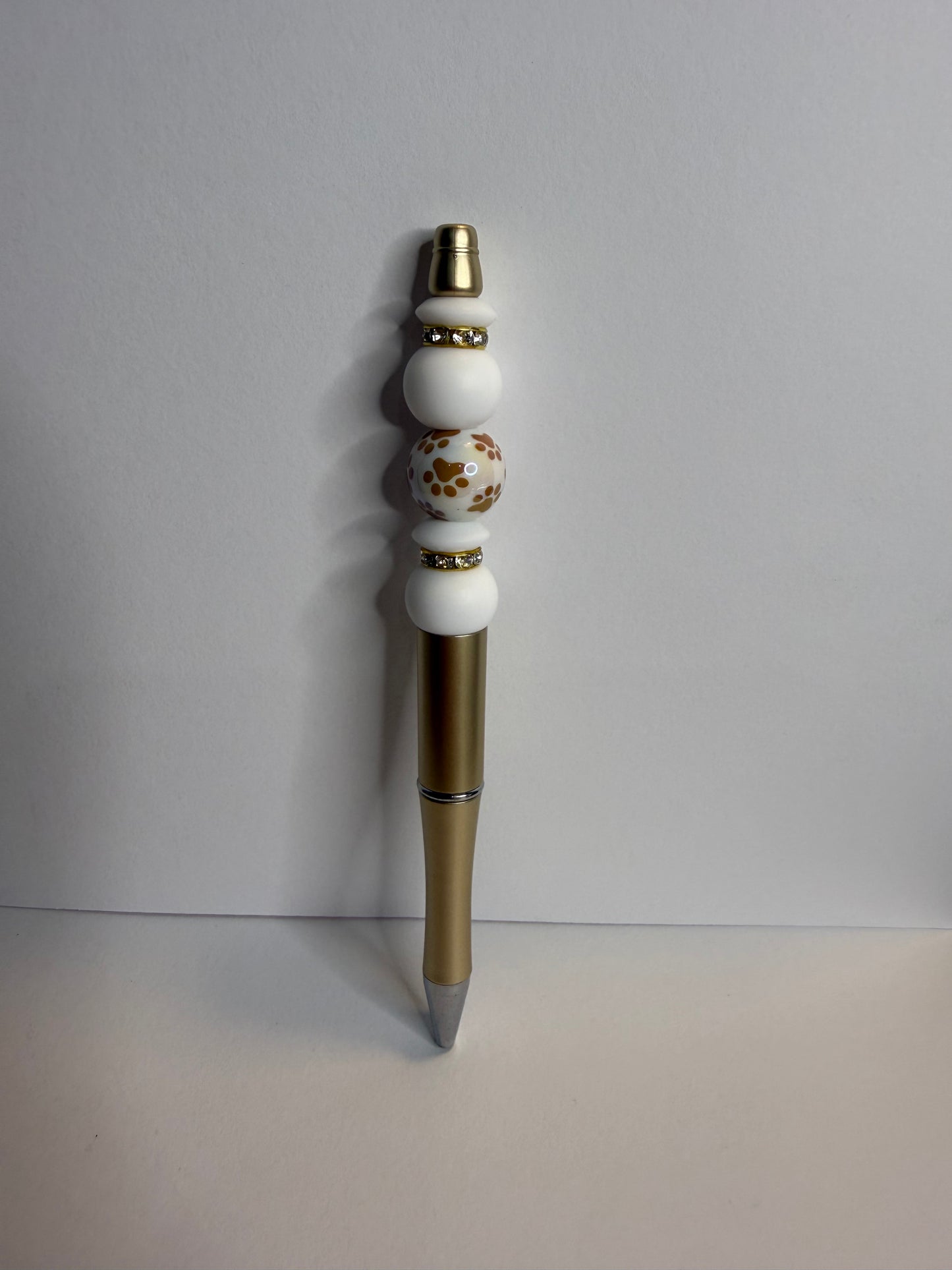 tan paw print premade pen