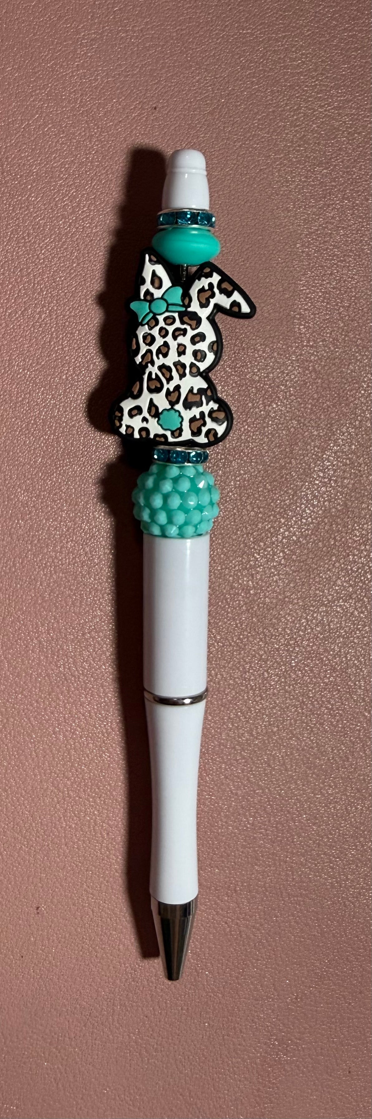 white and turquoise bunny premade pen