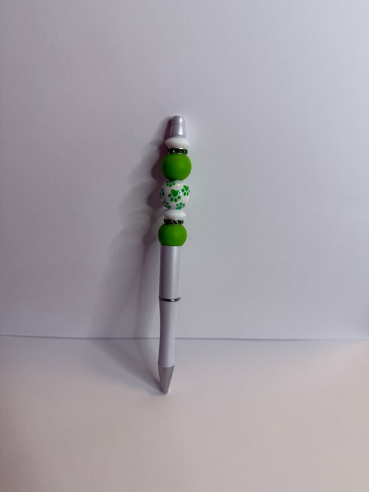 green paw print on white premade pen