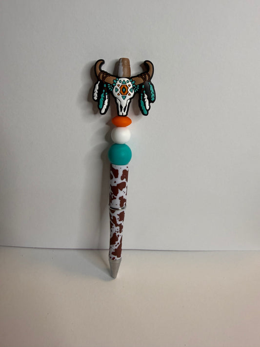 Skull with feathers on animal print premade pen