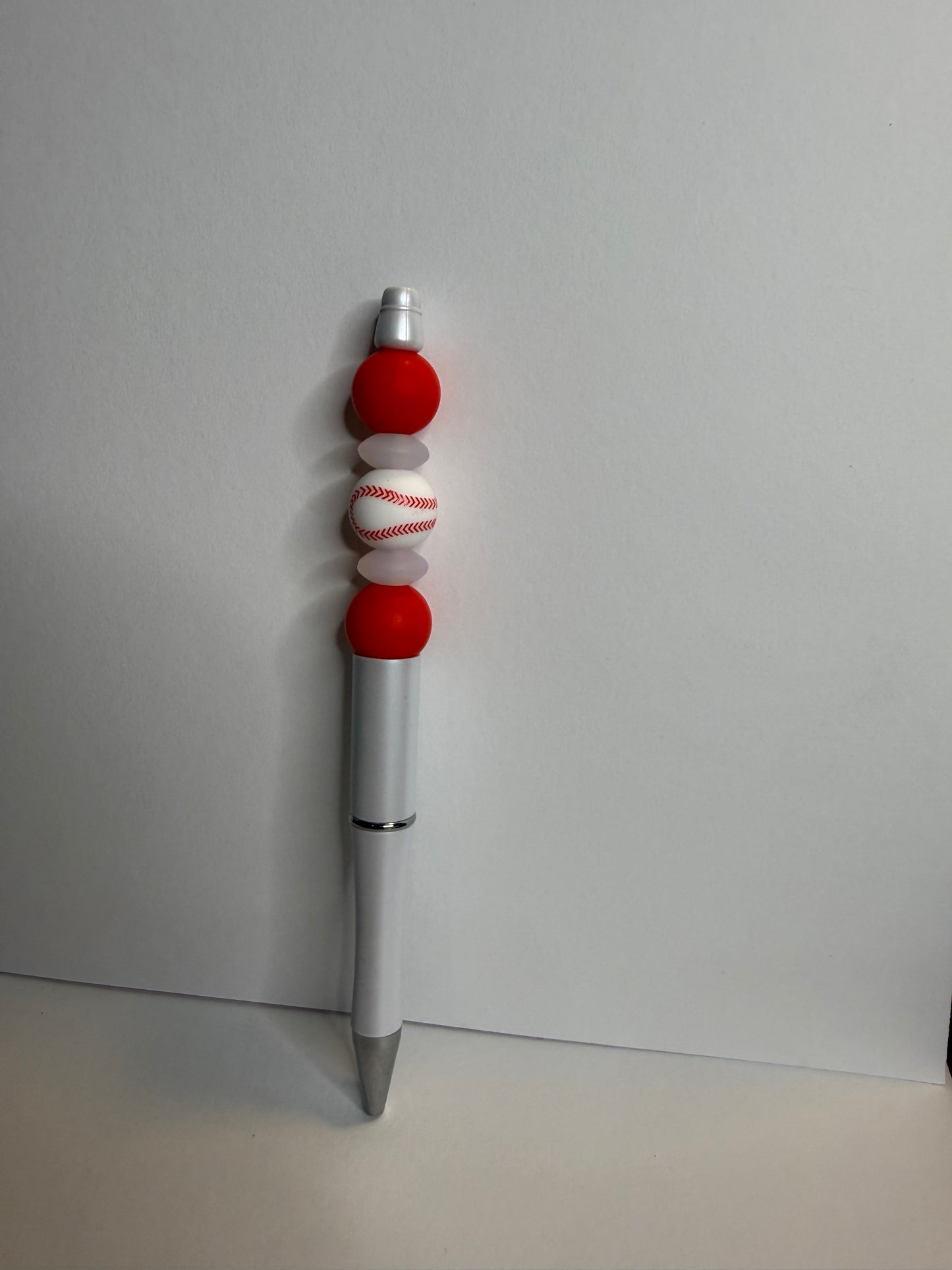 white and red baseball premade pen