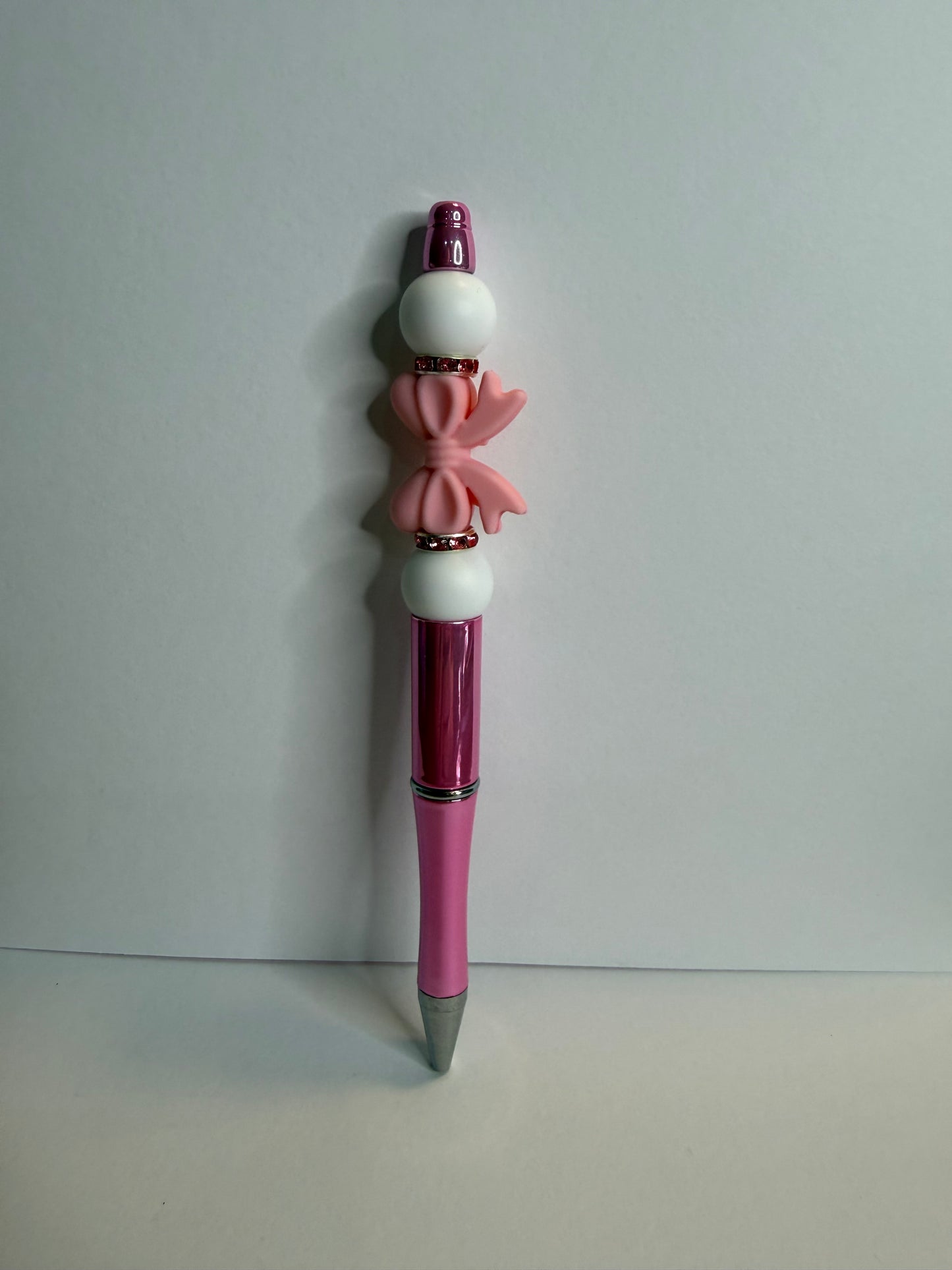 pink bow on pink premade pen