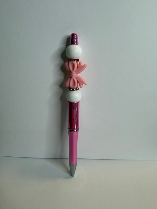 pink bow on pink premade pen