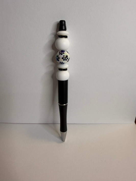 black and white paw print on black premade pen