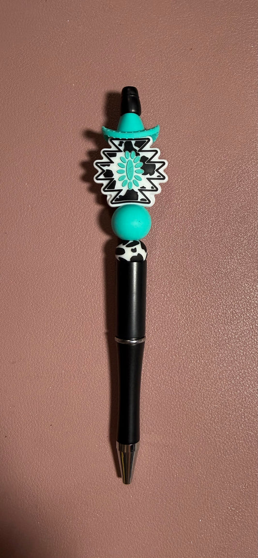 black, white, turquoise with hat premade pen