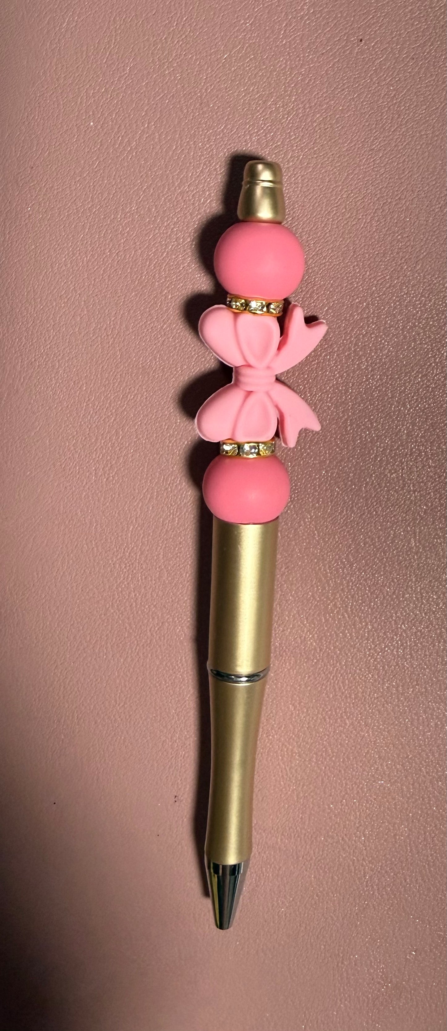 gold with pink bow premade pen