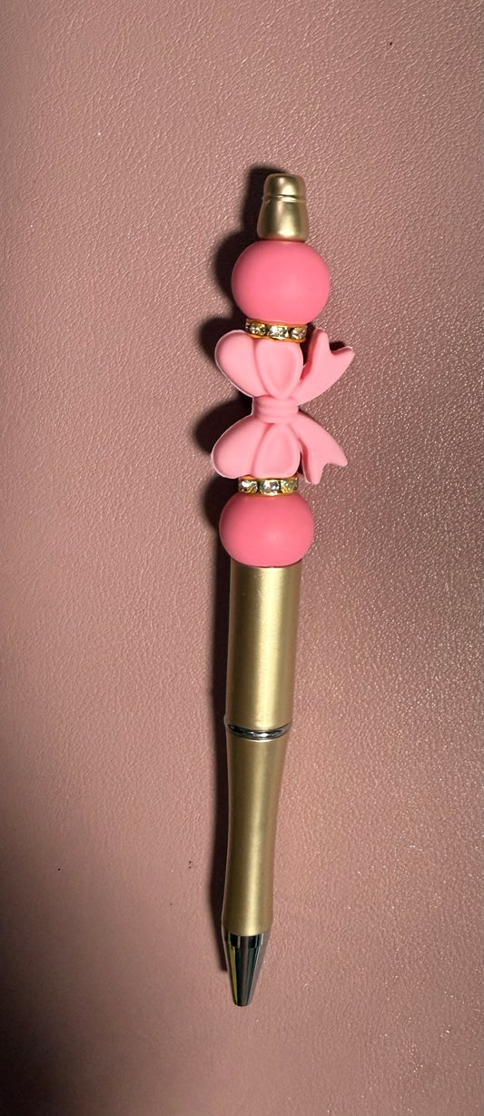 gold with pink bow premade pen